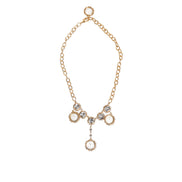Collana girocollo Dolce & Gabbana con ciondolo a orologio in cristallo dorato