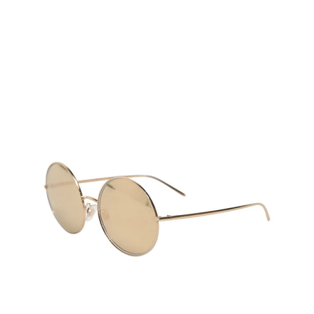 Occhiali da sole Dolce & Gabbana con lenti rotonde in metallo dorato