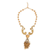 Collana pendente barocca Dolce & Gabbana con cherubino in ceramica dorata e cristallo