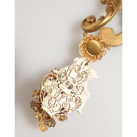Collana pendente barocca Dolce & Gabbana con cherubino in ceramica dorata e cristallo