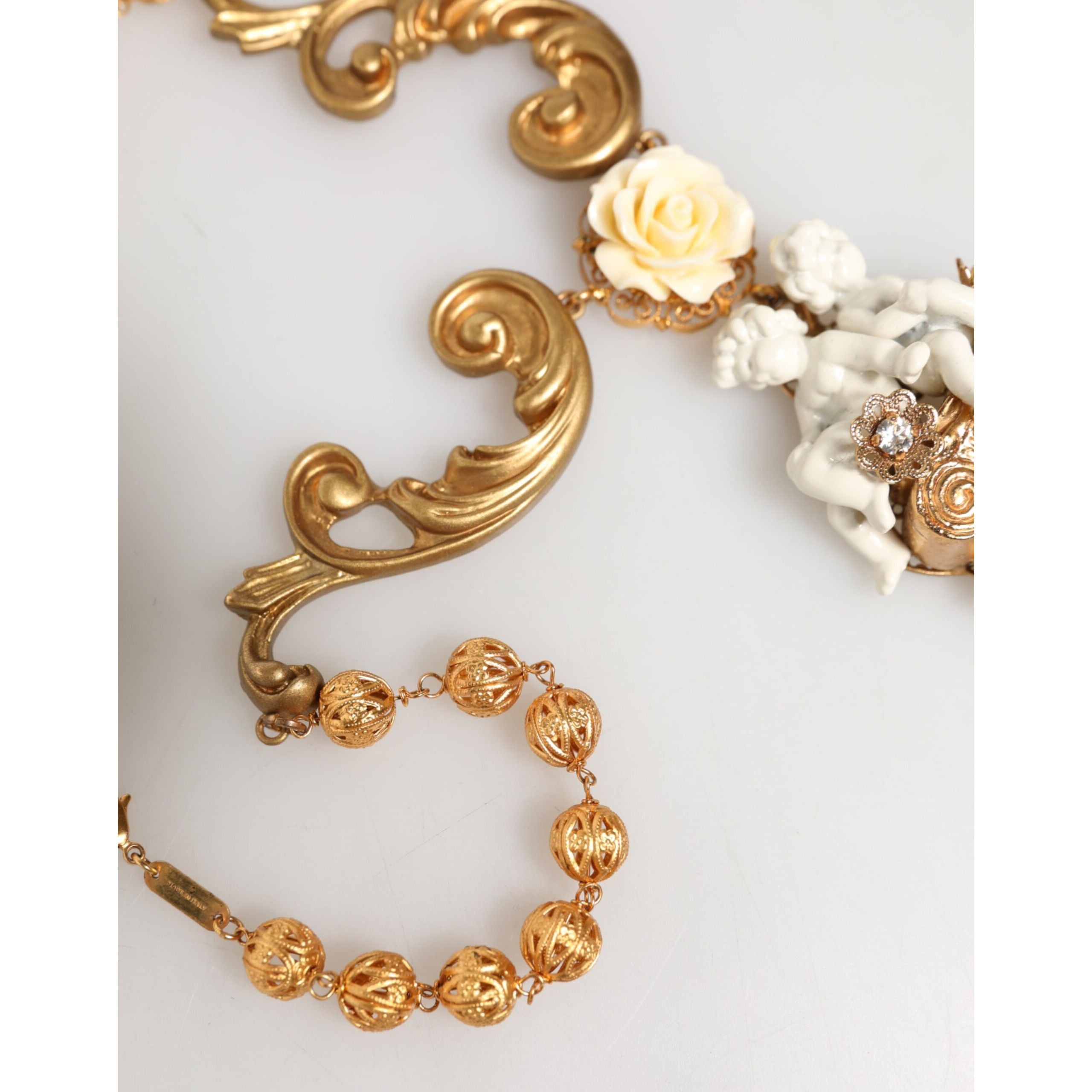 Collana pendente barocca Dolce & Gabbana con cherubino in ceramica dorata e cristallo