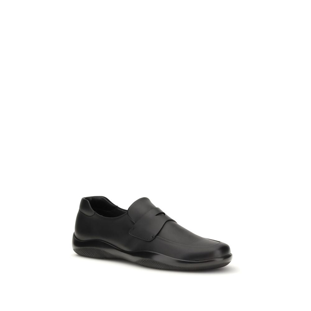 Mocassini slip-on Prada in pelle di vitello nera Bos Taurus