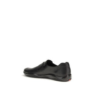 Mocassini slip-on Prada in pelle di vitello nera Bos Taurus