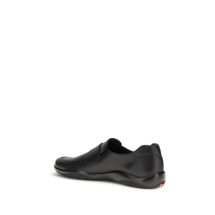 Mocassini slip-on Prada in pelle di vitello nera Bos Taurus