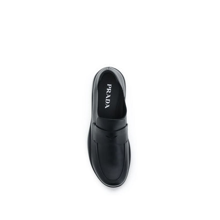 Mocassini slip-on Prada in pelle di vitello nera Bos Taurus