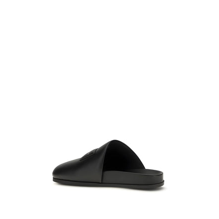 Mules Givenchy en cuir de veau noir Bos Taurus