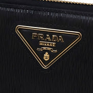 Portefeuille Prada en cuir de veau noir