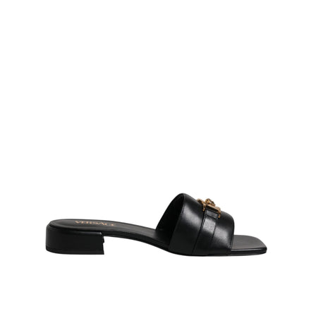 Versace Sandales plates en cuir noir à logo