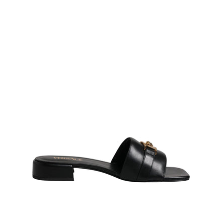 Versace Sandales plates en cuir noir à logo