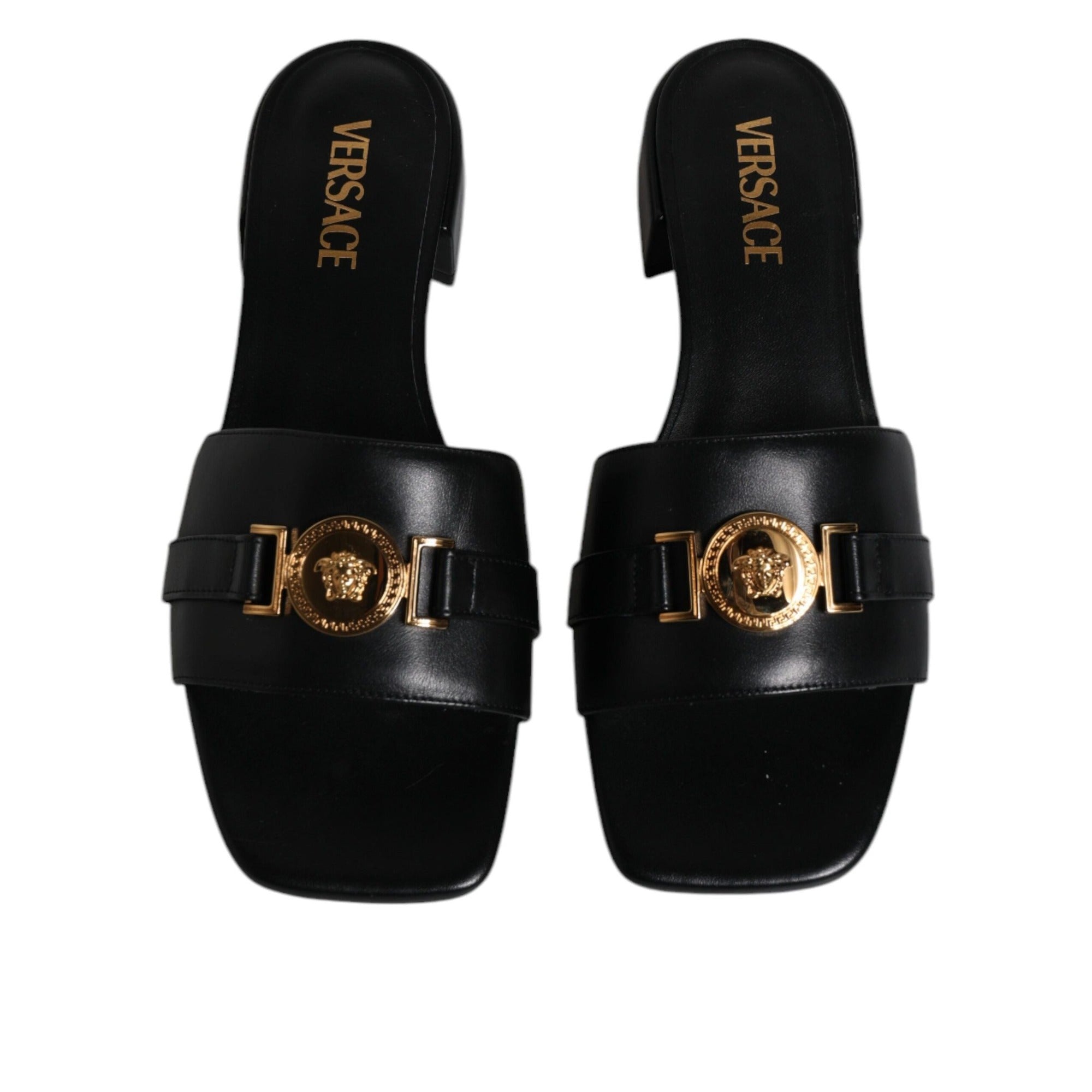 Versace Sandales plates en cuir noir à logo