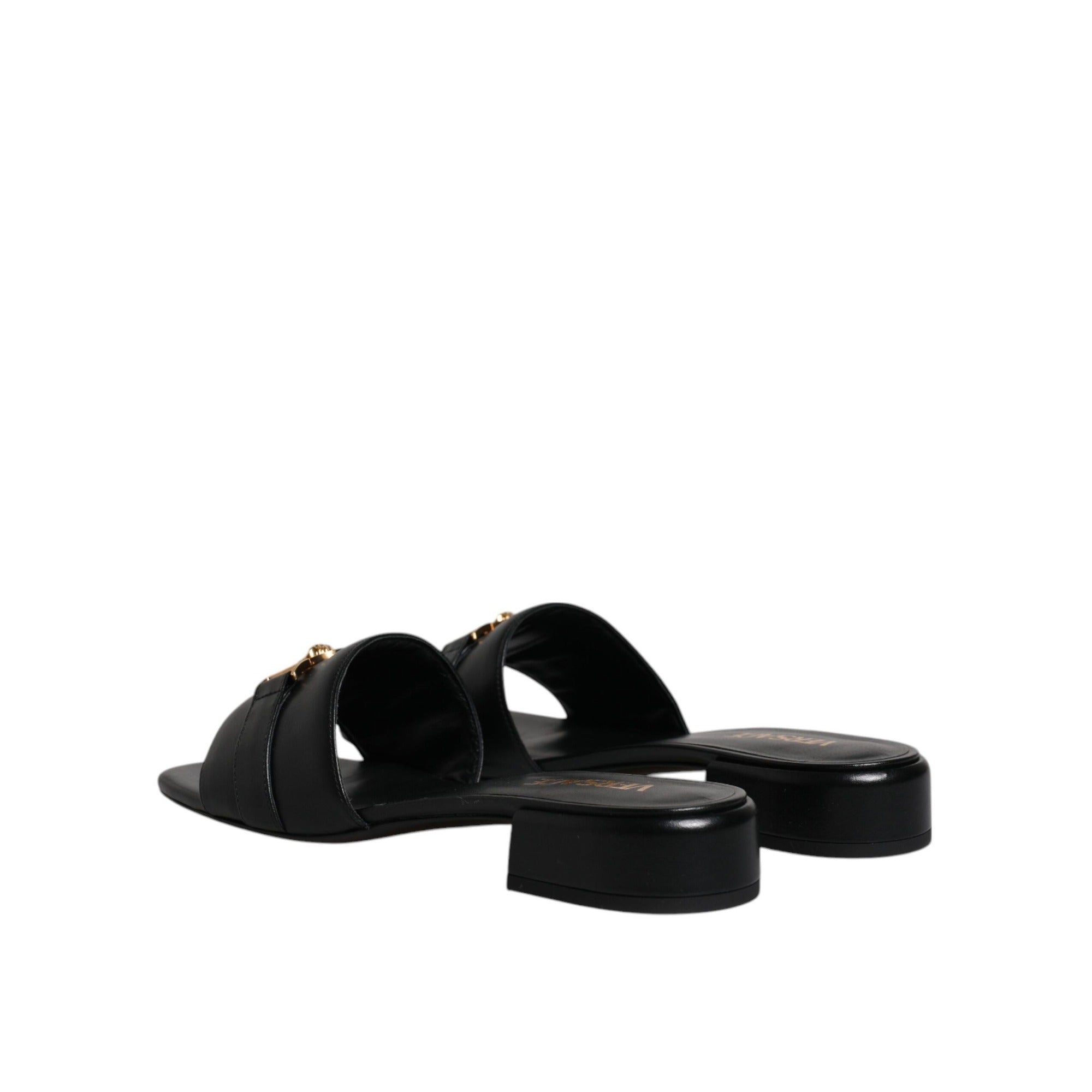 Versace Sandales plates en cuir noir à logo
