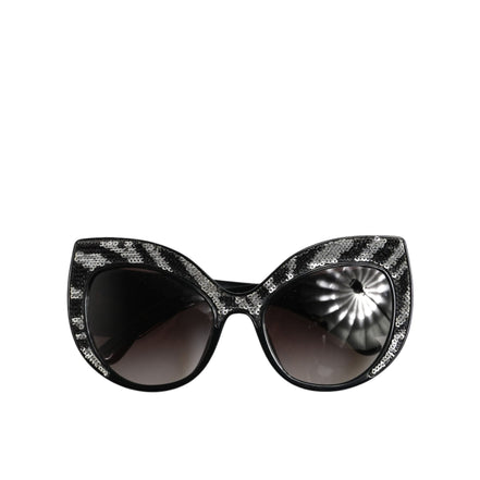 Lunettes de soleil polarisées Dolce & Gabbana avec papillon à sequins noirs et argentés