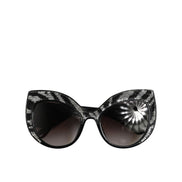 Lunettes de soleil polarisées Dolce & Gabbana avec papillon à sequins noirs et argentés