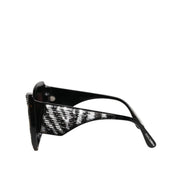 Lunettes de soleil polarisées Dolce & Gabbana avec papillon à sequins noirs et argentés