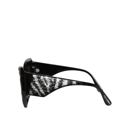 Lunettes de soleil polarisées Dolce & Gabbana avec papillon à sequins noirs et argentés