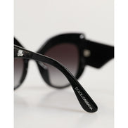Lunettes de soleil polarisées Dolce & Gabbana avec papillon à sequins noirs et argentés