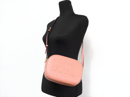 Sac bandoulière appareil photo ovale moyen Michael Kors Jet Set Travel en cuir Sherbert