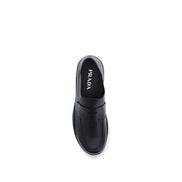Mocassins à enfiler Prada en cuir de veau noir Bos Taurus