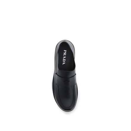 Mocassins à enfiler Prada en cuir de veau noir Bos Taurus