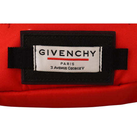 Close-up of Givenchy Paris logo patch on a red designer bag
